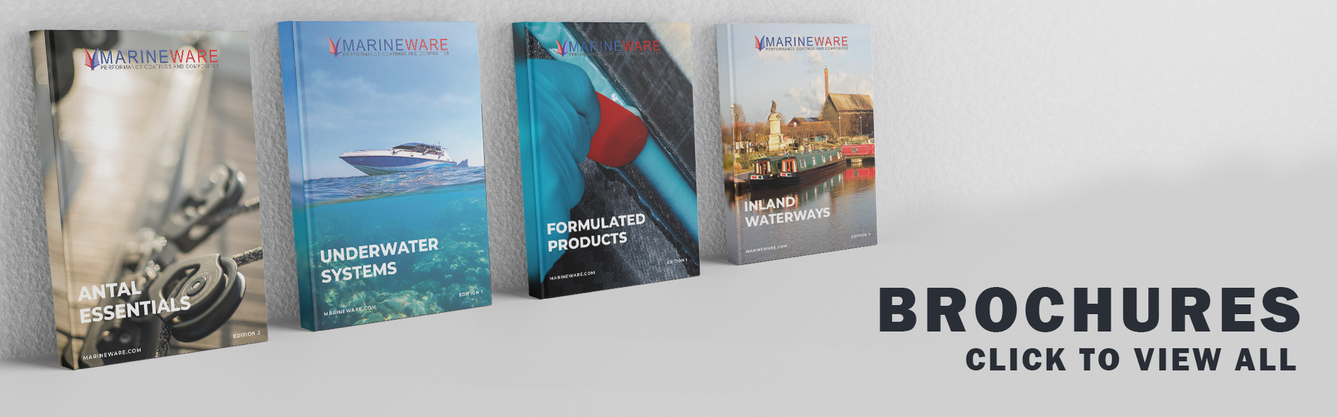 Brochures lent up against a white wall