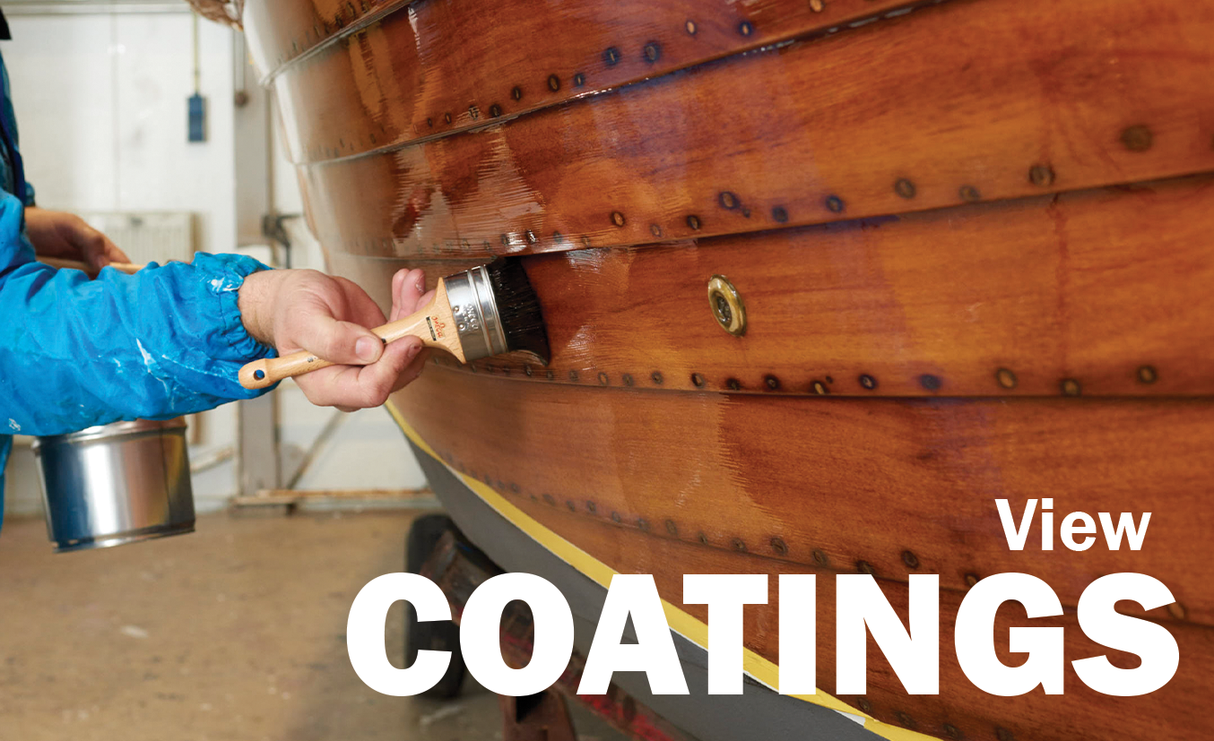 Brown Boat Being Painted With Varnish